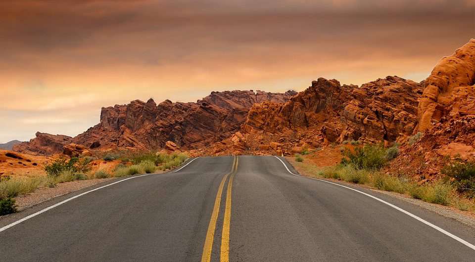 An image of a road representing travel